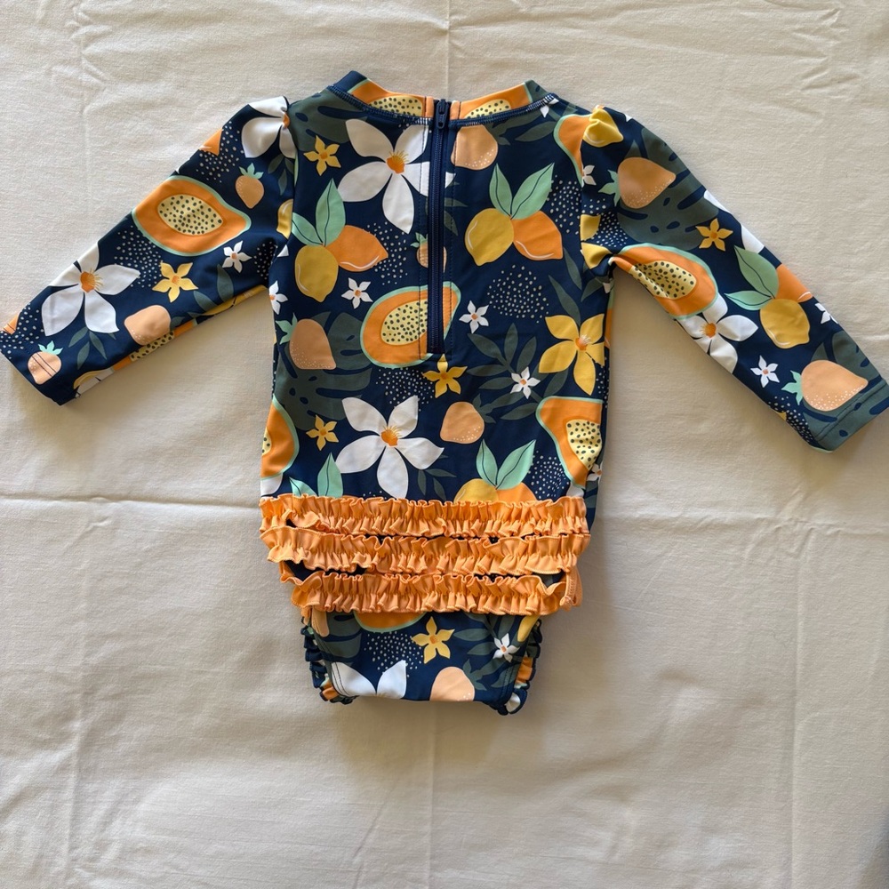 Ruffle Butts Navy and Orange Fruit/Flower Print Swimsuit (12-18 Mos)